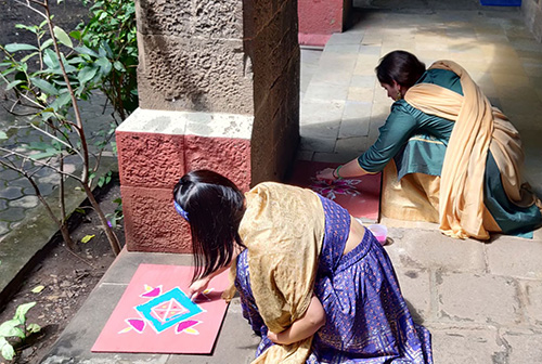 AYLP 2022-23 students drawing Rangoli