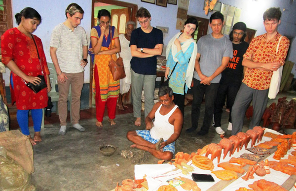 With a terracotta craft artist